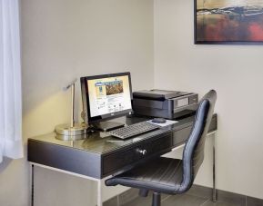 Business center with computer, printer and ergonomic chair at Comfort Inn Cobourg.