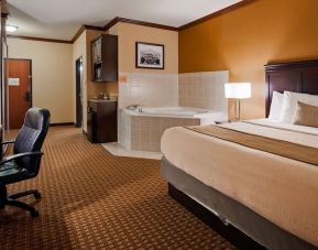 Day use room with bath tub and work desk at Best Western Granbury Inn & Suites.