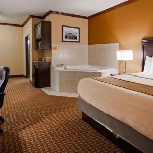 Day use room with bath tub and work desk at Best Western Granbury Inn & Suites.