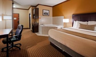 Day use room with bath tub and work desk at Best Western Granbury Inn & Suites.