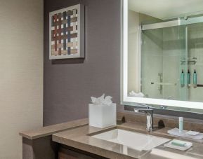 Guest bathroom with shower at Courtyard Boston Marlborough.