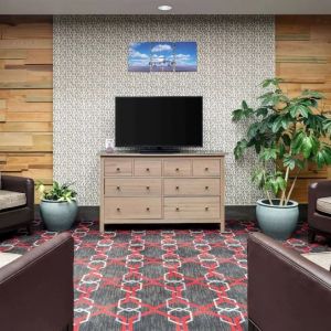 Lobby and coworking lounge at Wyndham Garden Pittsburgh Airport.