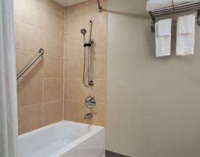 Guest bathroom with shower and tub at Wyndham Garden Pittsburgh Airport.