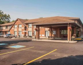 Hotel entrance and parking area at Comfort Inn Orillia.