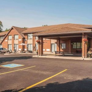 Hotel entrance and parking area at Comfort Inn Orillia.