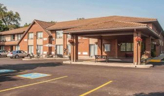 Hotel entrance and parking area at Comfort Inn Orillia.