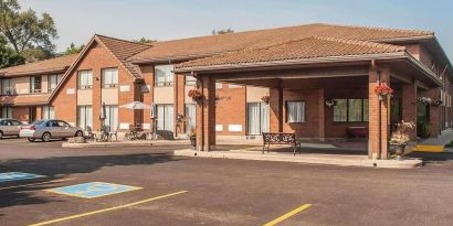 Hotel entrance and parking area at Comfort Inn Orillia.