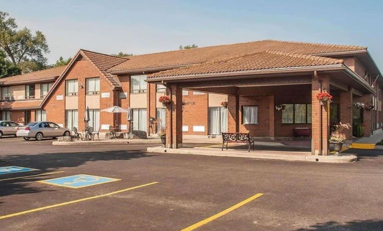 Hotel entrance and parking area at Comfort Inn Orillia.