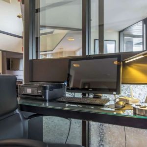 Business center with computer, printer and ergonomic chair at Comfort Inn New Glasgow.