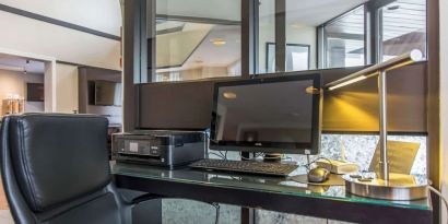 Business center with computer, printer and ergonomic chair at Comfort Inn New Glasgow.