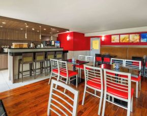 Dining area with comfortable seating at Comfort Inn Newmarket.