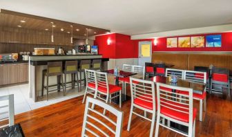 Dining area with comfortable seating at Comfort Inn Newmarket.