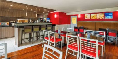 Dining area with comfortable seating at Comfort Inn Newmarket.