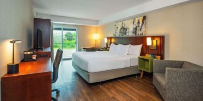 Day use room with TV, sofa, work desk and private bathroom at Comfort Inn Newmarket.