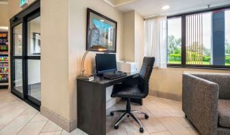 Business center with computer, printer and ergonomic chair at Comfort Inn Newmarket.