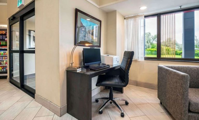 Business center with computer, printer and ergonomic chair at Comfort Inn Newmarket.