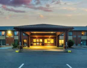 Hotel entrance and parking area at Comfort Inn Kingston HWY 401.