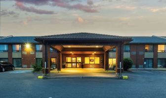 Hotel entrance and parking area at Comfort Inn Kingston HWY 401.