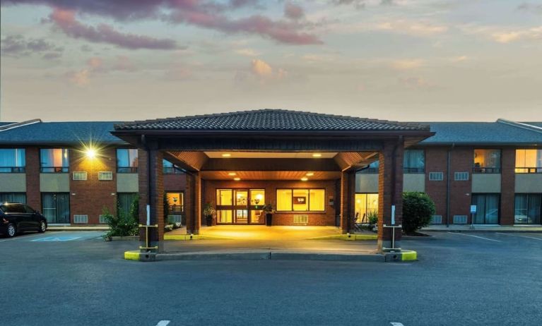 Hotel entrance and parking area at Comfort Inn Kingston HWY 401.