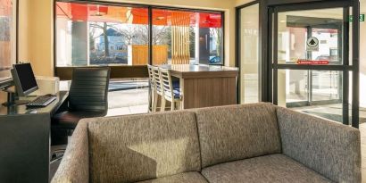 Lobby lounge with workspace at Comfort Inn Ottawa West.