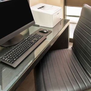 Business center with computer, printer and ergonomic chair at Comfort Inn Ottawa West.