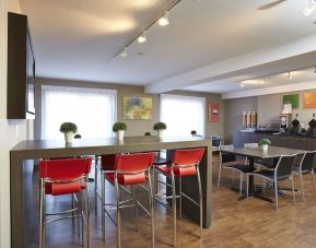 Dining area with comfortable seating, perfect for co-working at Comfort Inn Edmundston.