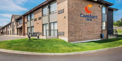 Hotel exterior and parking area at Comfort Inn Edmundston.