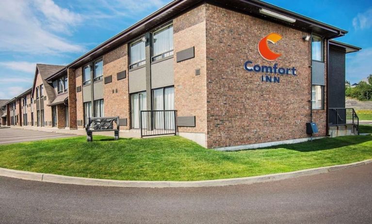 Hotel exterior and parking area at Comfort Inn Edmundston.