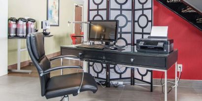 Business center with computer, printer and ergonomic chair at Comfort Inn Edmundston.