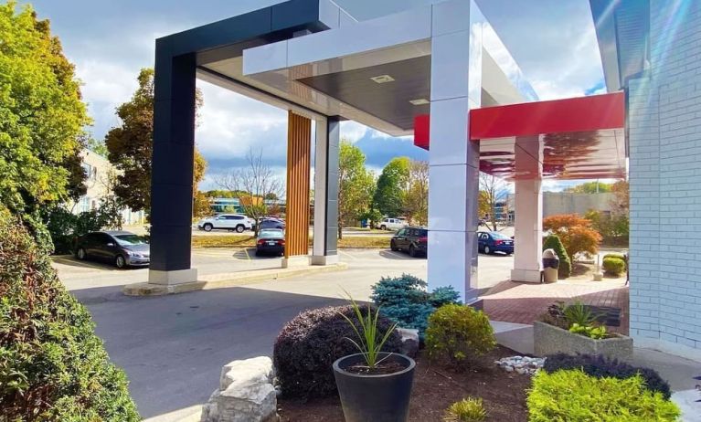 Hotel entrance and parking area at Comfort Inn Dryden.