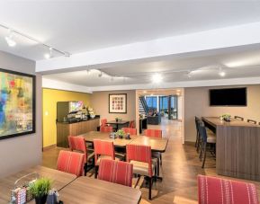 Dining area with comfortable seating perfect for co-working at Comfort Inn Dryden.