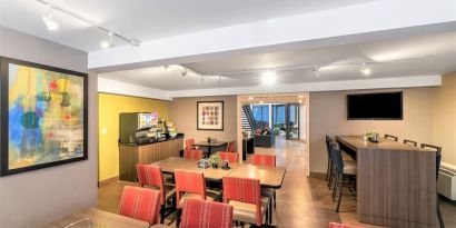 Dining area with comfortable seating perfect for co-working at Comfort Inn Dryden.