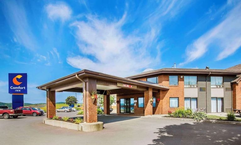 Hotel entrance and parking area at Comfort Inn Amherst.