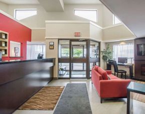 Hotel lobby with lounge area and workspace at Comfort Inn Amherst.