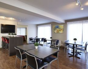 Dining area with comfortable seating at Comfort Inn Amherst.