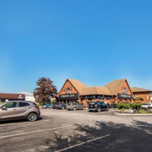 Hotel exterior and parking area at Comfort Inn Brantford.