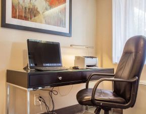 Business center with computer, printer and ergonomic chair at Comfort Inn Brantford.