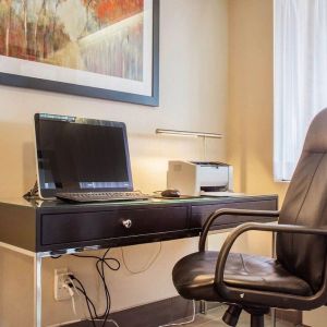 Business center with computer, printer and ergonomic chair at Comfort Inn Brantford.