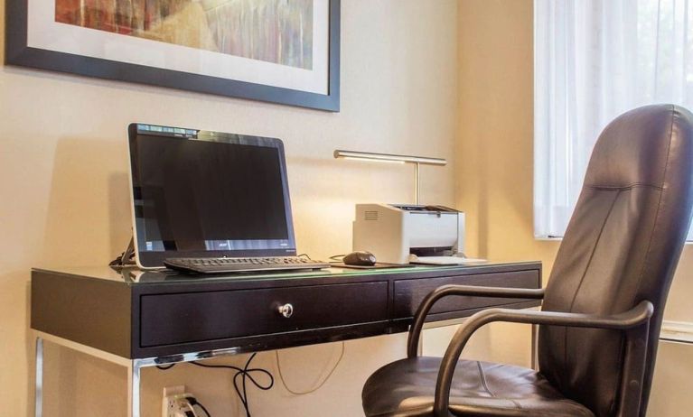 Business center with computer, printer and ergonomic chair at Comfort Inn Brantford.