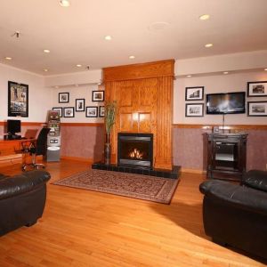 Lobby lounge with workspace, fireplace and ATM at Mount Peyton Resort & Conference Center.