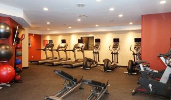 Fully equipped fitness center at TownePlace Suites By Marriott London.