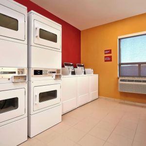 Laundry room at TownePlace Suites By Marriott London.