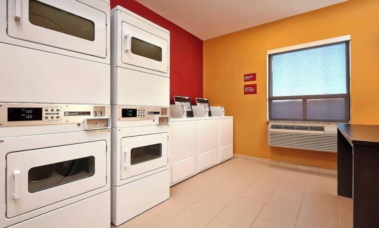 Laundry room at TownePlace Suites By Marriott London.