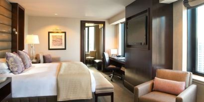 Day use room with sofa and work desk at Hyatt Regency Boston.