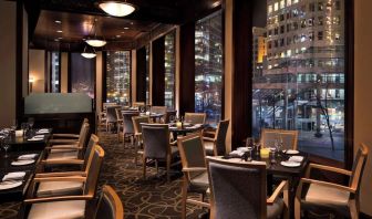 Dining area with comfortable seating, perfect for co-working at Hyatt Regency Vancouver.