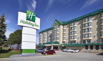 Hotel exterior and parking area at Holiday Inn Conference Center Edmonton South.