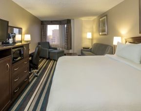 Day use room with work desk and living area at Holiday Inn Conference Center Edmonton South.