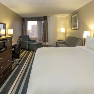 Day use room with work desk and living area at Holiday Inn Conference Center Edmonton South.