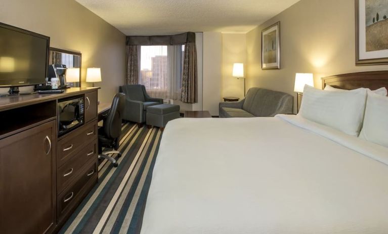 Day use room with work desk and living area at Holiday Inn Conference Center Edmonton South.