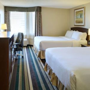 Bright and spacious day use twin room with work desk and private bathroom at Holiday Inn Conference Center Edmonton South.